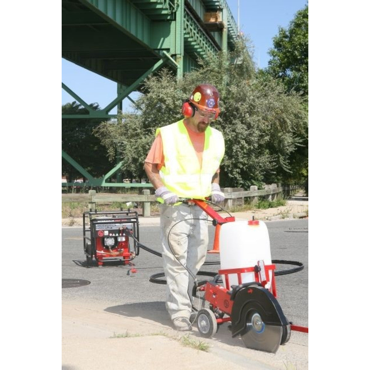 Chicago Pneumatic CART-SAW walk-behind cut-off saw cart with water tank in use