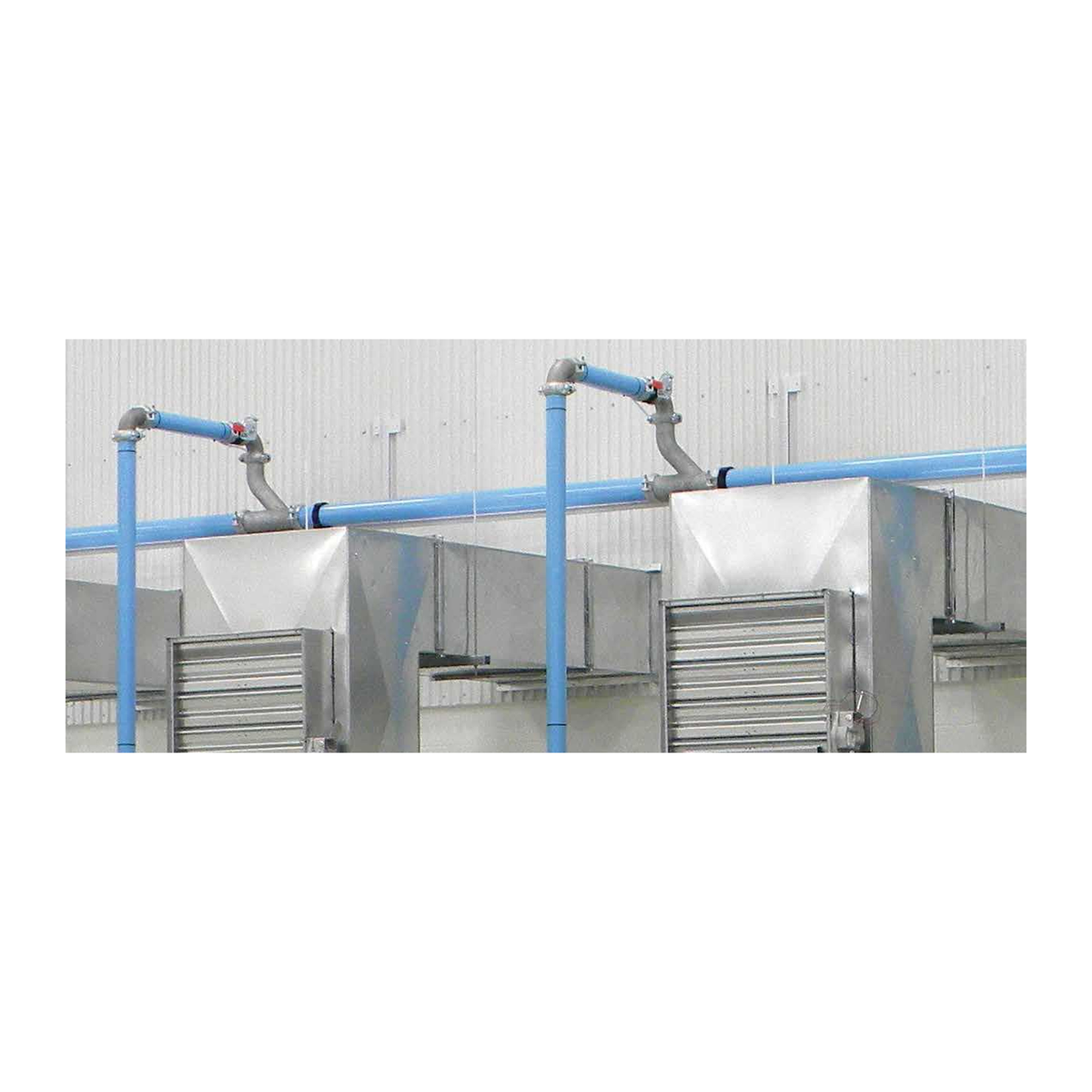 Champion Big-Lock large diameter blue aluminum compressed air main installed overhead in a plant