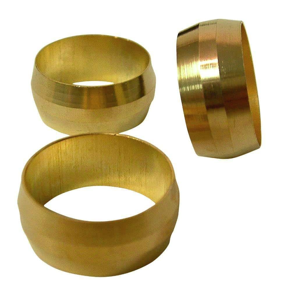 Brass compression ferrule sleeves for compression tube fittings on white background